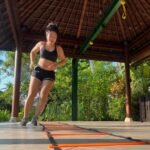 Outdoor yoga and bodyweight workout at wellness retreat Bali