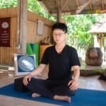 erson practicing mindfulness meditation in nature